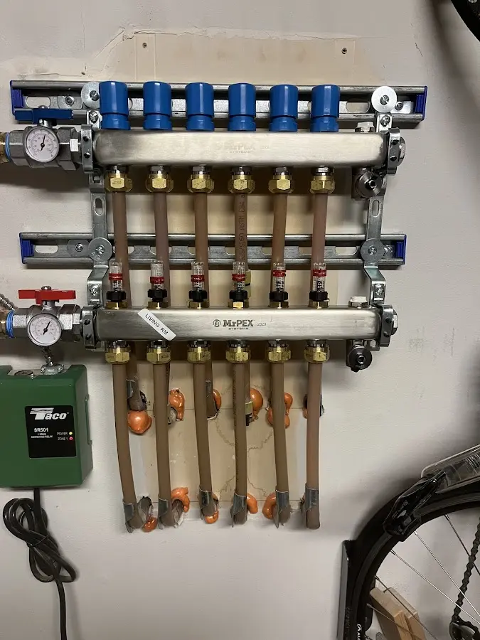 Plumber performing Water Heater Repair at a residential property in Blanchard